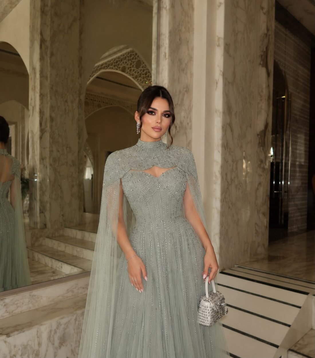 Sage Green High Neck Cape Dress Dubai with beaded cape overlay and flowing skirt