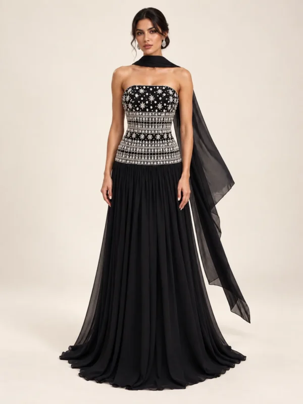 Black strapless gown with silver embellished bodice and flowing scarf
