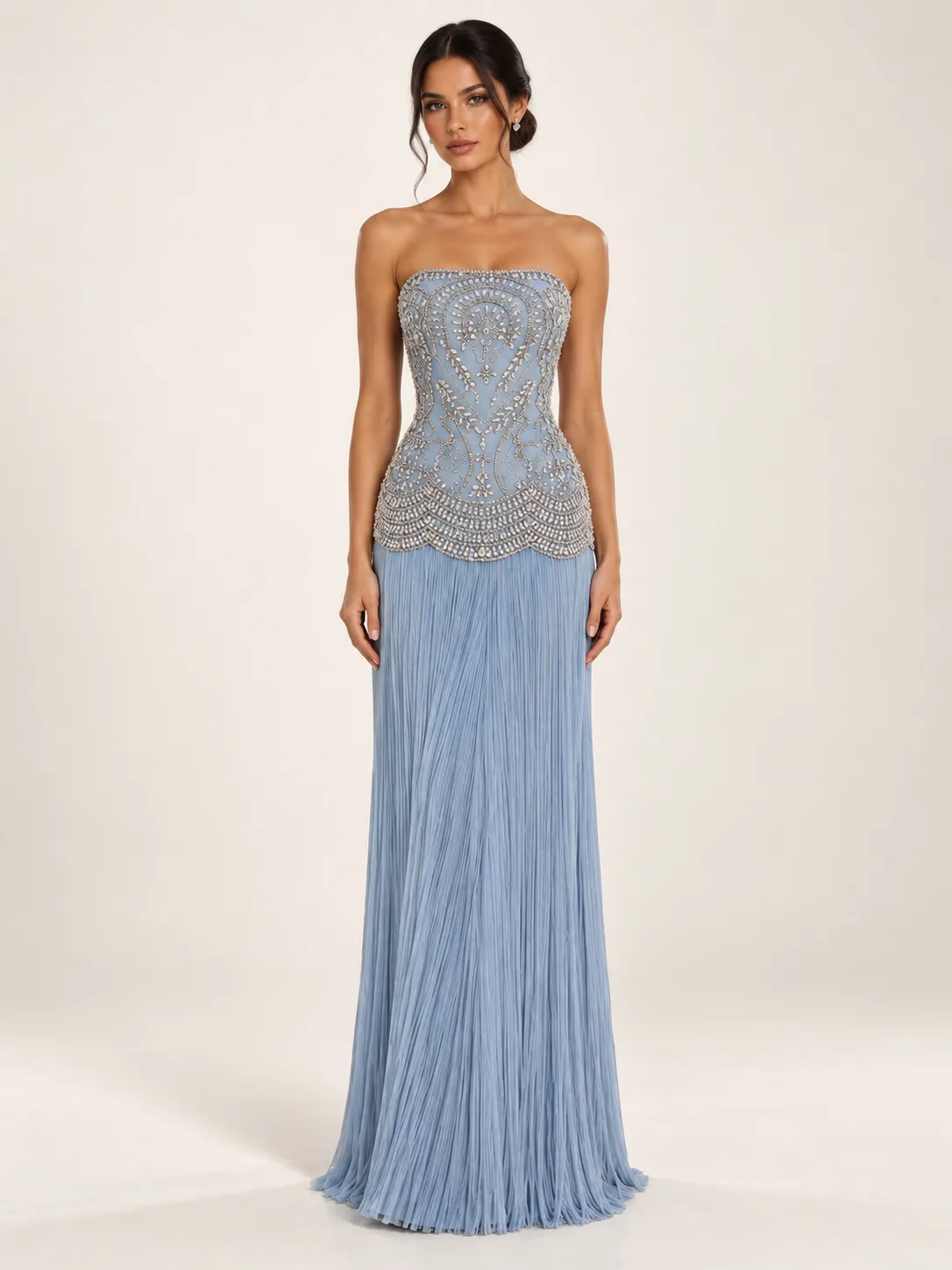 Powder blue strapless silver embellished gown with floor-length fringe skirt